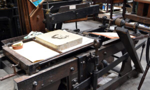 Lithographic press and stone.